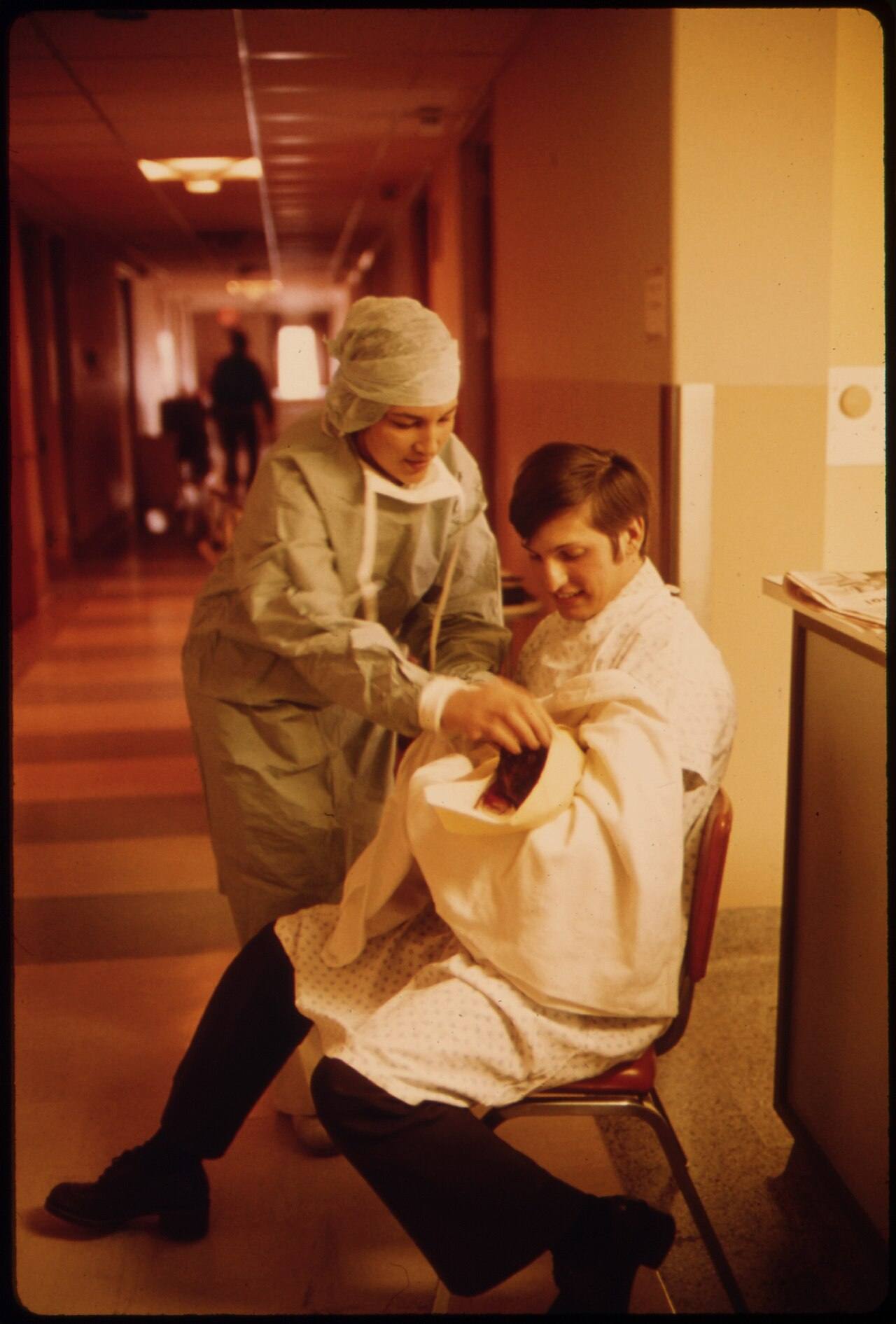 A New Father Holds His Child for the First Time in Loretto Hospital in New Ulm, Minnesota. There Are Two Hospitals In...