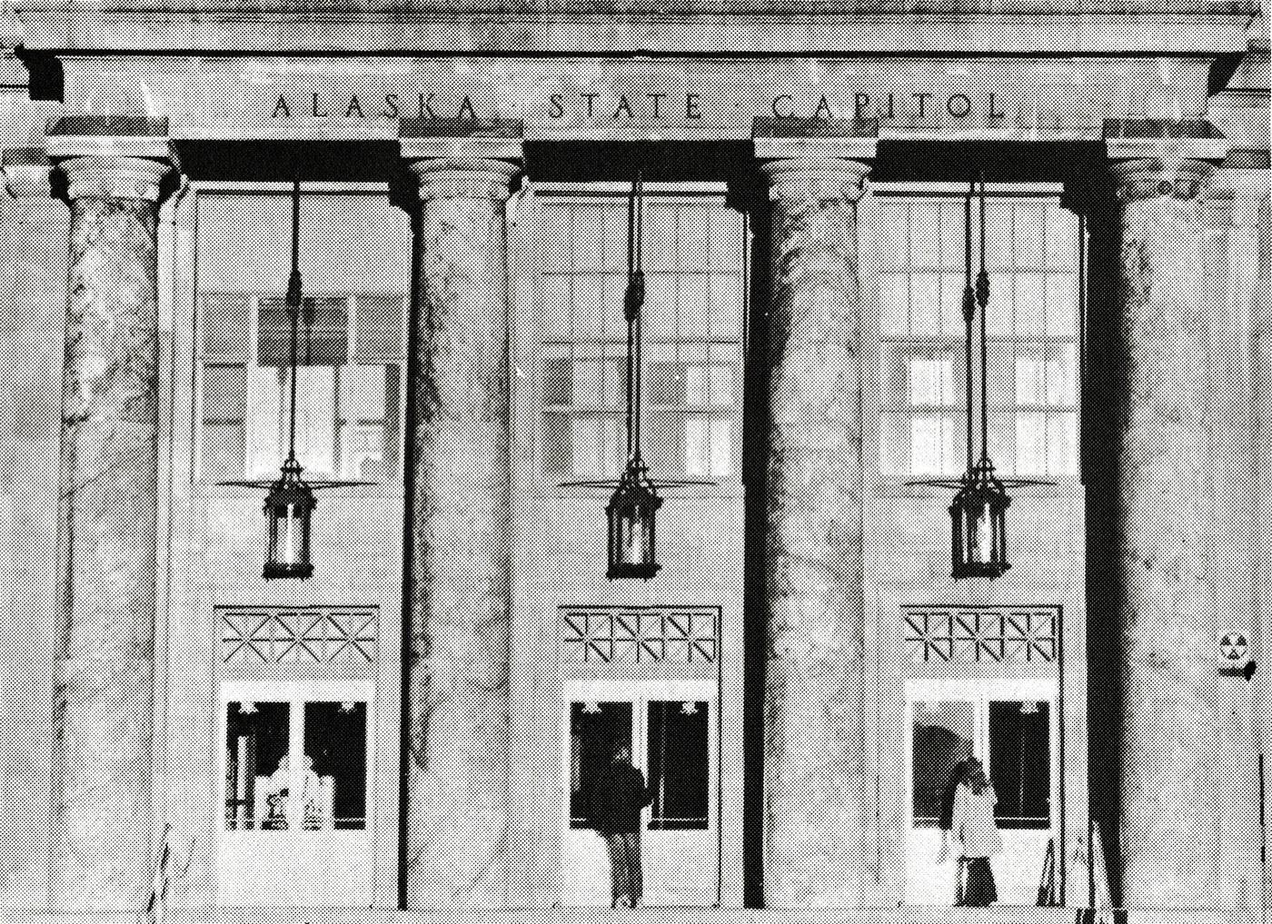 Closeup view of the front entrance and marble columns of the Alaska State Capitol as it appeared in the early-mid 1970s.