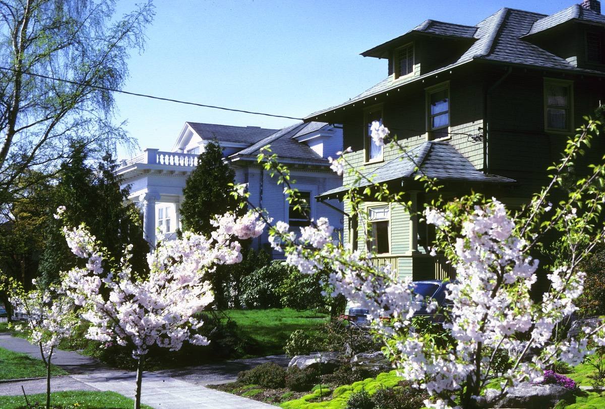 905 and 913 12th Avenue E, Seattle, Washington, U.S., 1970s. Both of these houses are still there as of 2021, though this view would now show mostly tree.