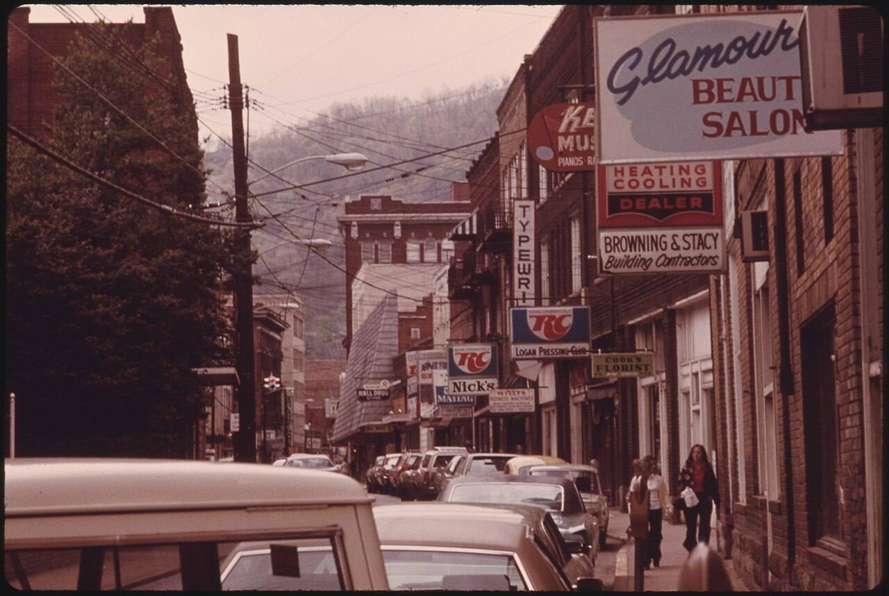Main Street of Logan, West Virginia, Showing a Narrow Street with Parking on Only One Side Which is Typical in Many...