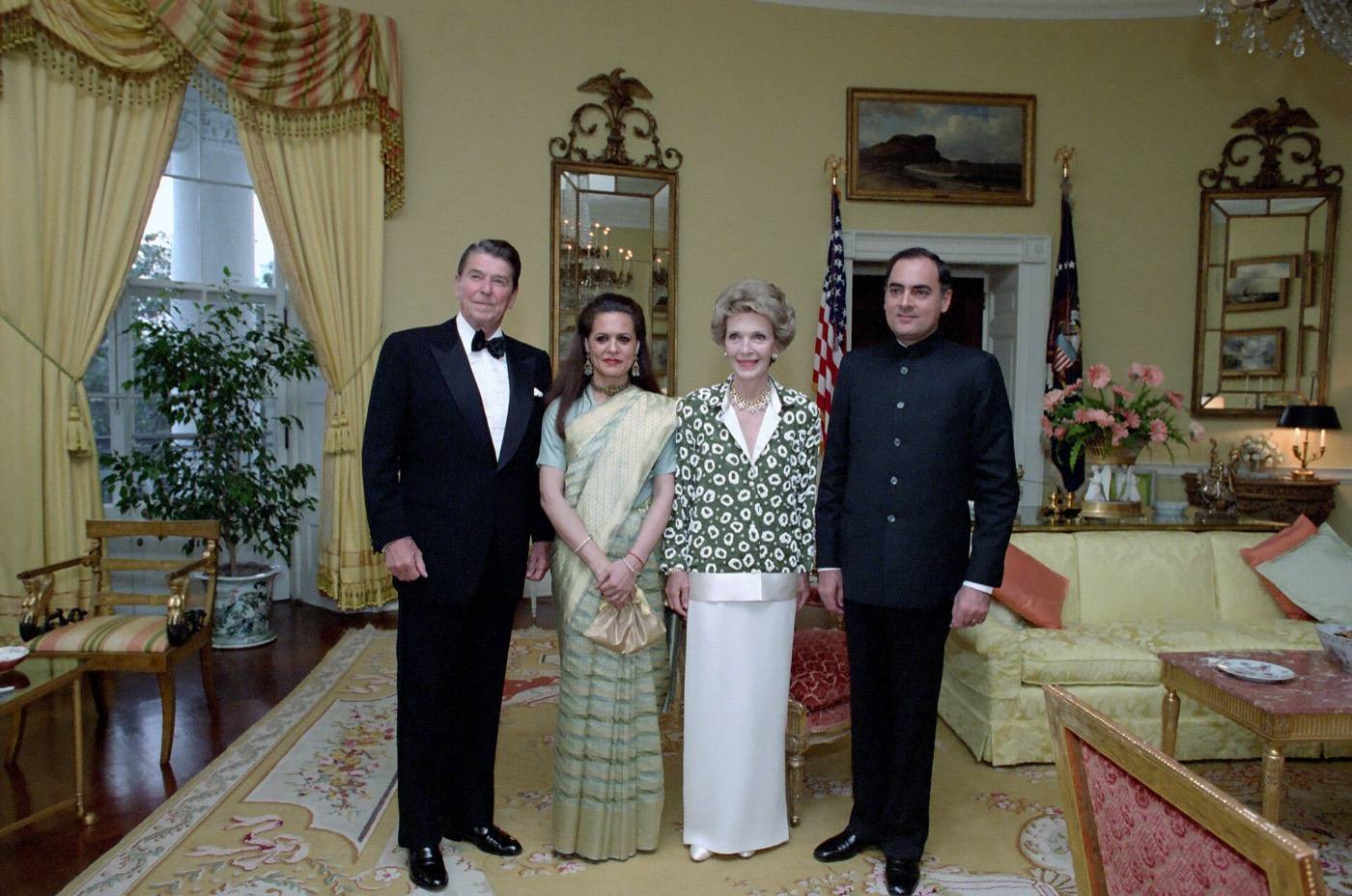 President Ronald Reagan Nancy Reagan Rajiv Gandhi and Mrs Gandhi in The Yellow Oval Room During a State Dinner for Prime Minister Rajiv Gandhi of India