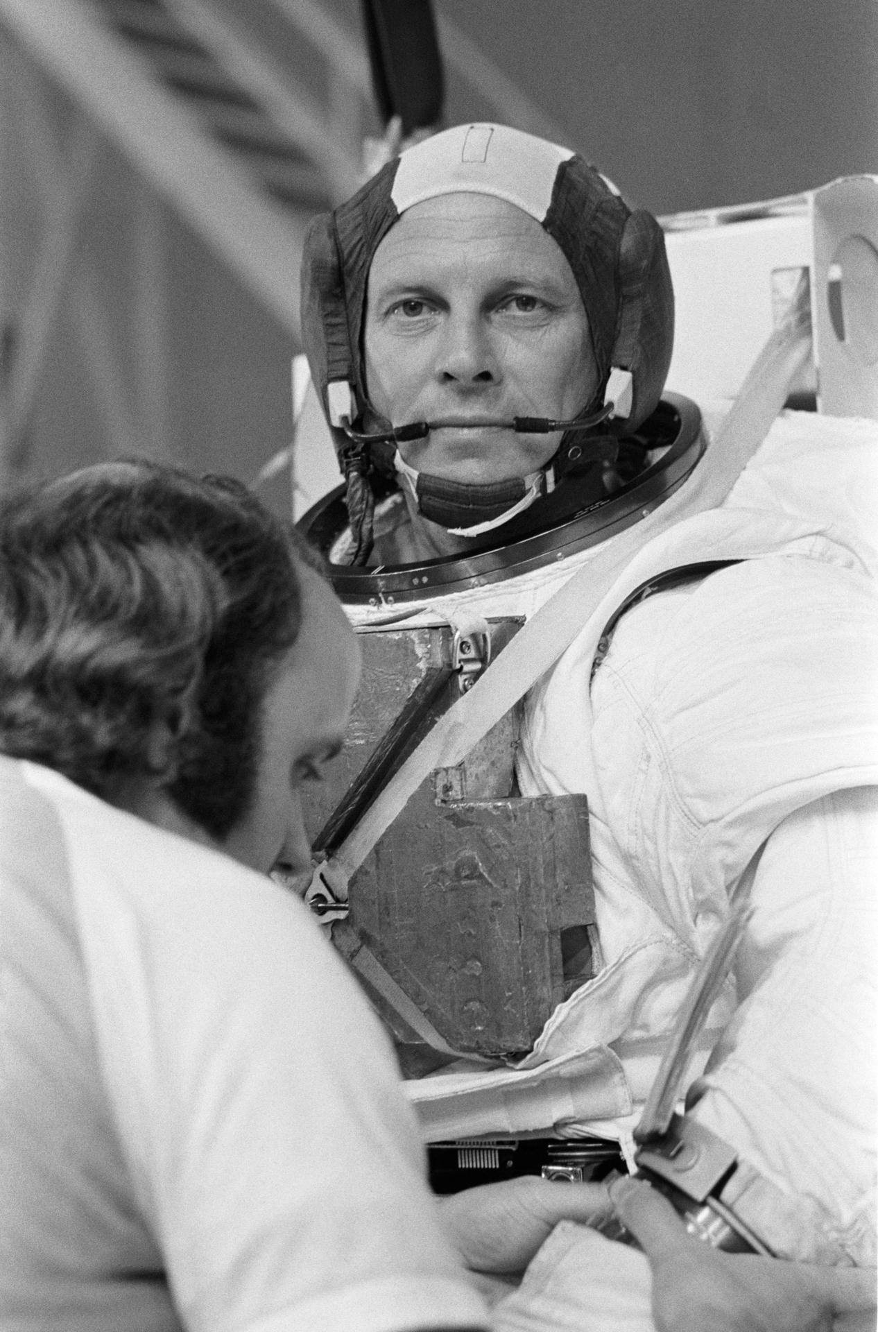 Portrait view of astronaut Jack Lousma in the Extravehicular Mobility Unit (EMU) at bldg 29 Weightless Environment Training Facility (WETF). He is wearing the E