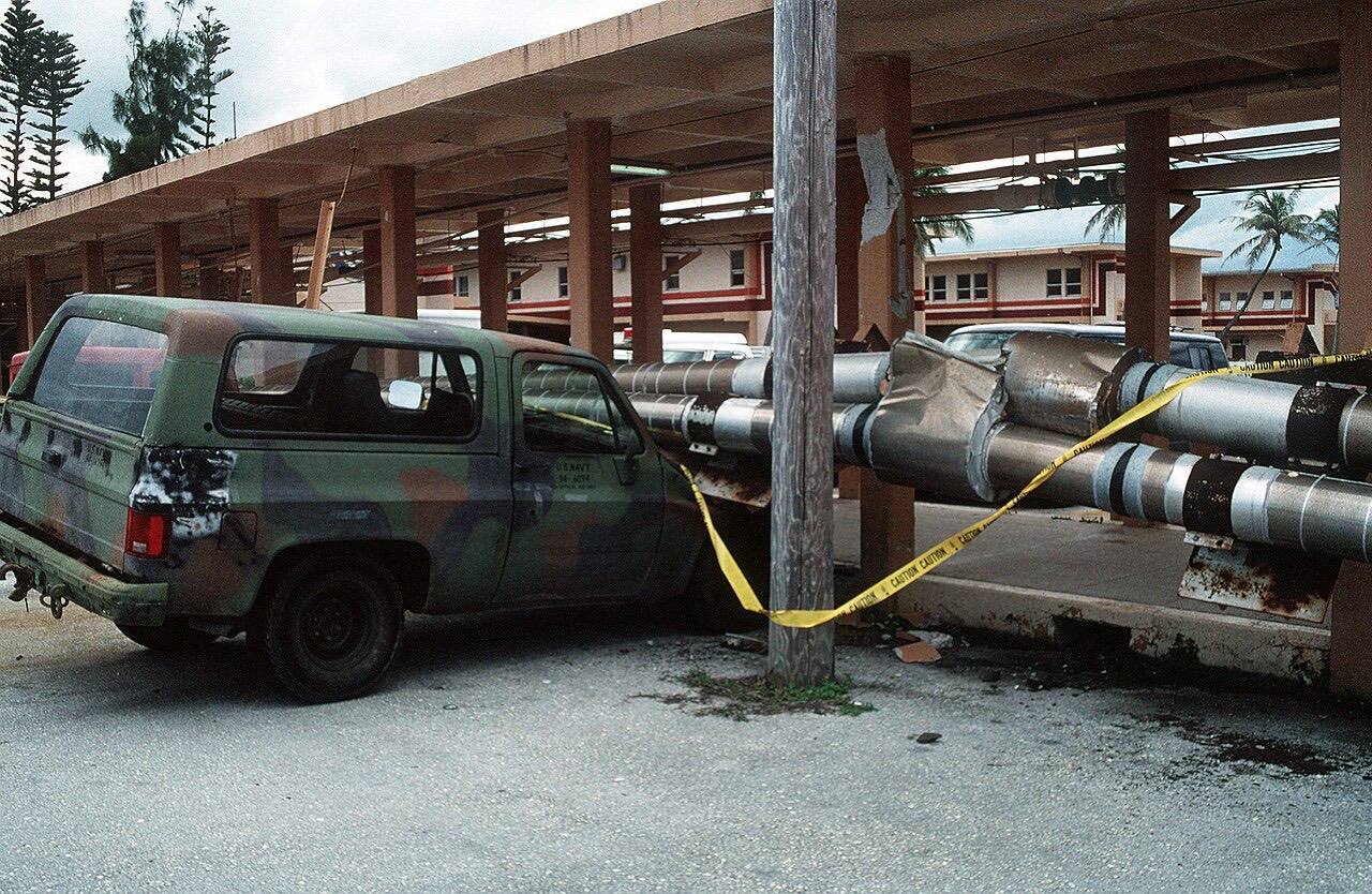 A truck is pinned under steam pipes that fell during an earthquake which struck the region on August 8th. National Archives Identifier: 6487025 Local Identifier