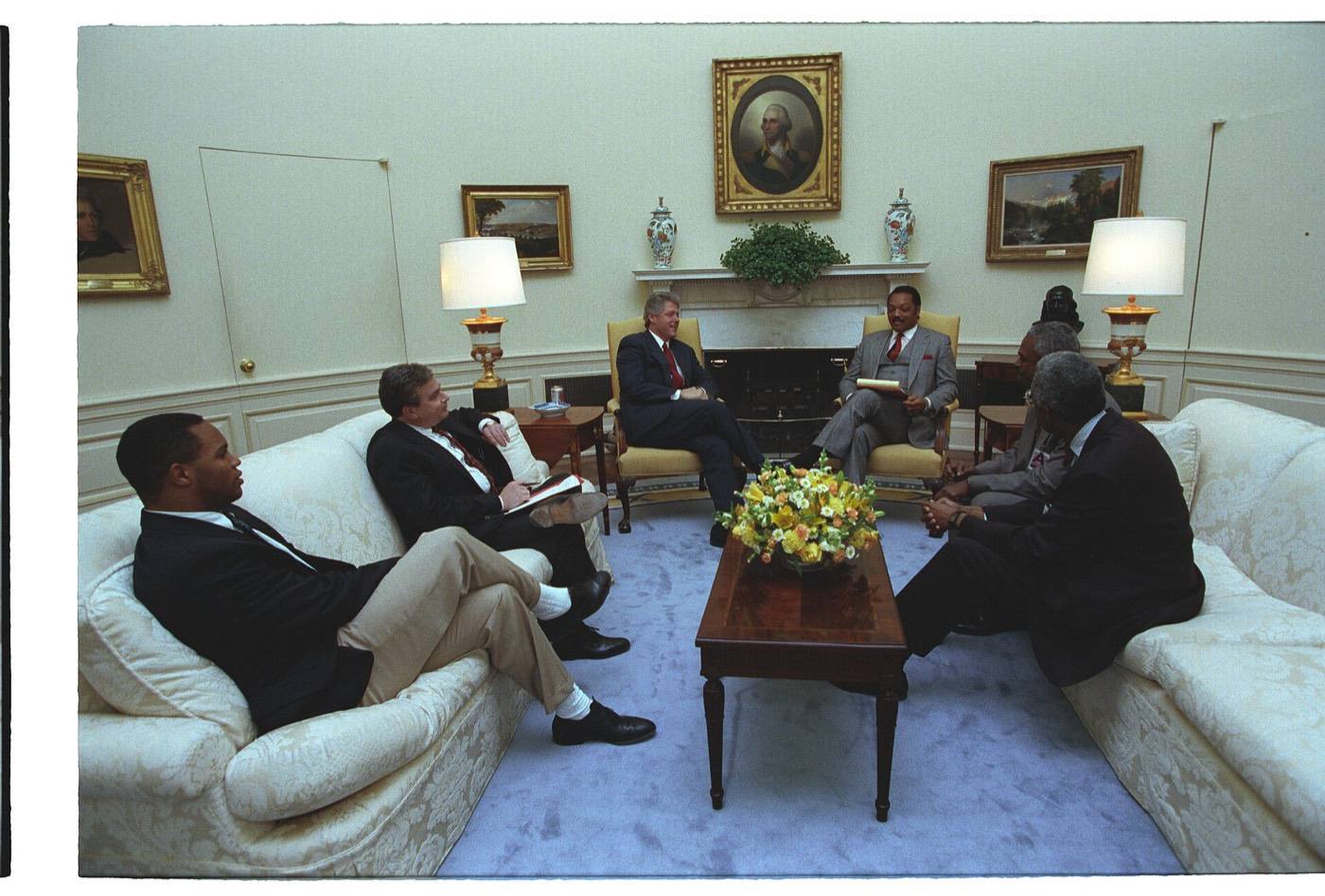 President Bill Clinton meets with Reverend Jesse Jackson in the Oval Office in the White House (09)