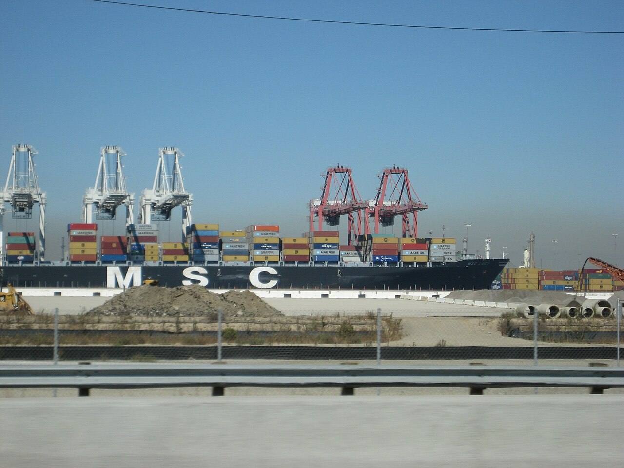 Container ship MSC LUCY being loaded in a container port IMO Number: 9289104 MMSI Number: 371059000 Callsign: 3EBC5 Length: 325 m Beam: 43 m