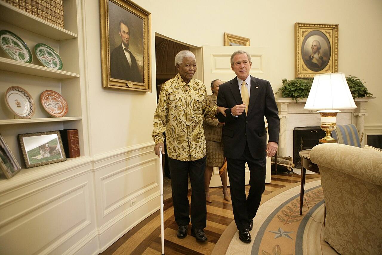 President George W. Bush and Former President Nelson Mandela of South Africa Meet in the Oval Office, 5/17/2005