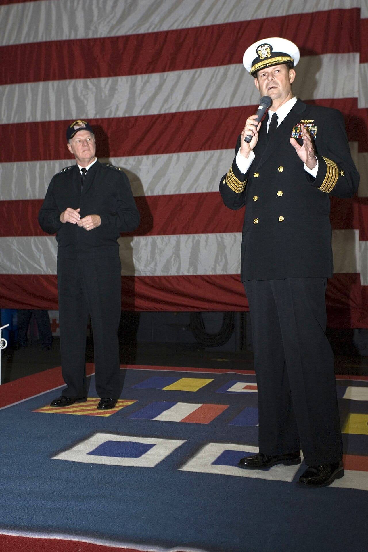 US Navy 070419-N-8591H-017 USS Kitty Hawk (CV 63) Commanding Officer, Capt. Ed McNamee, introduces Adm. Gary Roughead, commander, U.S.