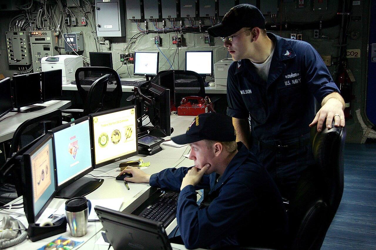 US Navy 060612-N-9102N-003 Sailors aboard the amphibious assault ship USS Bonhomme Richard (LHD 6) test systems in the Joint Operations Center in preparation fo