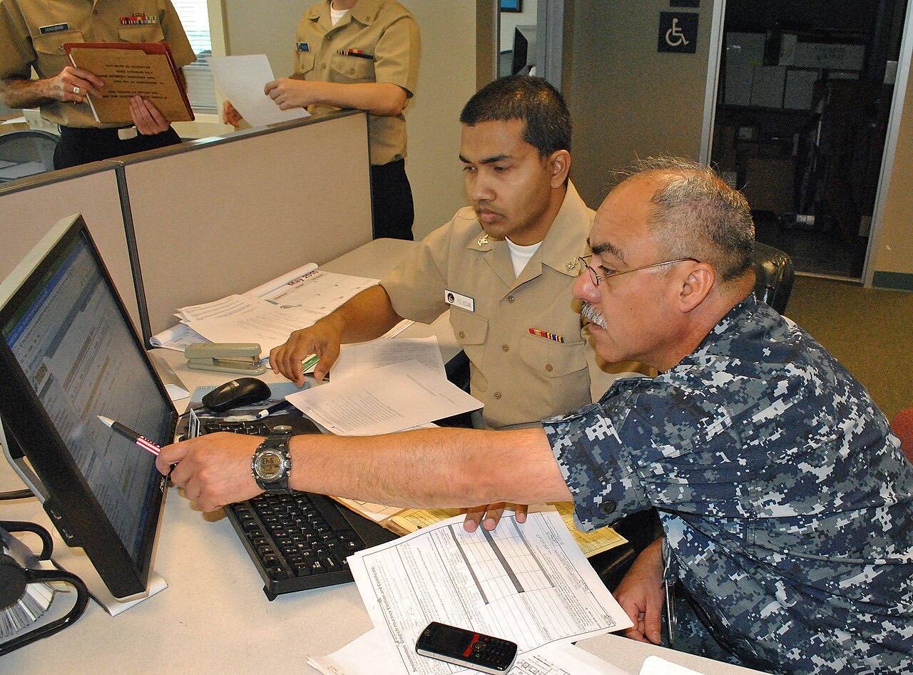 US Navy 100612-N-8374E-533 Chief Hospital Corpsman Hugo A. Castellanos, right, a Reserve Component member assigned to Operational Health Support Unit, Dallas, D