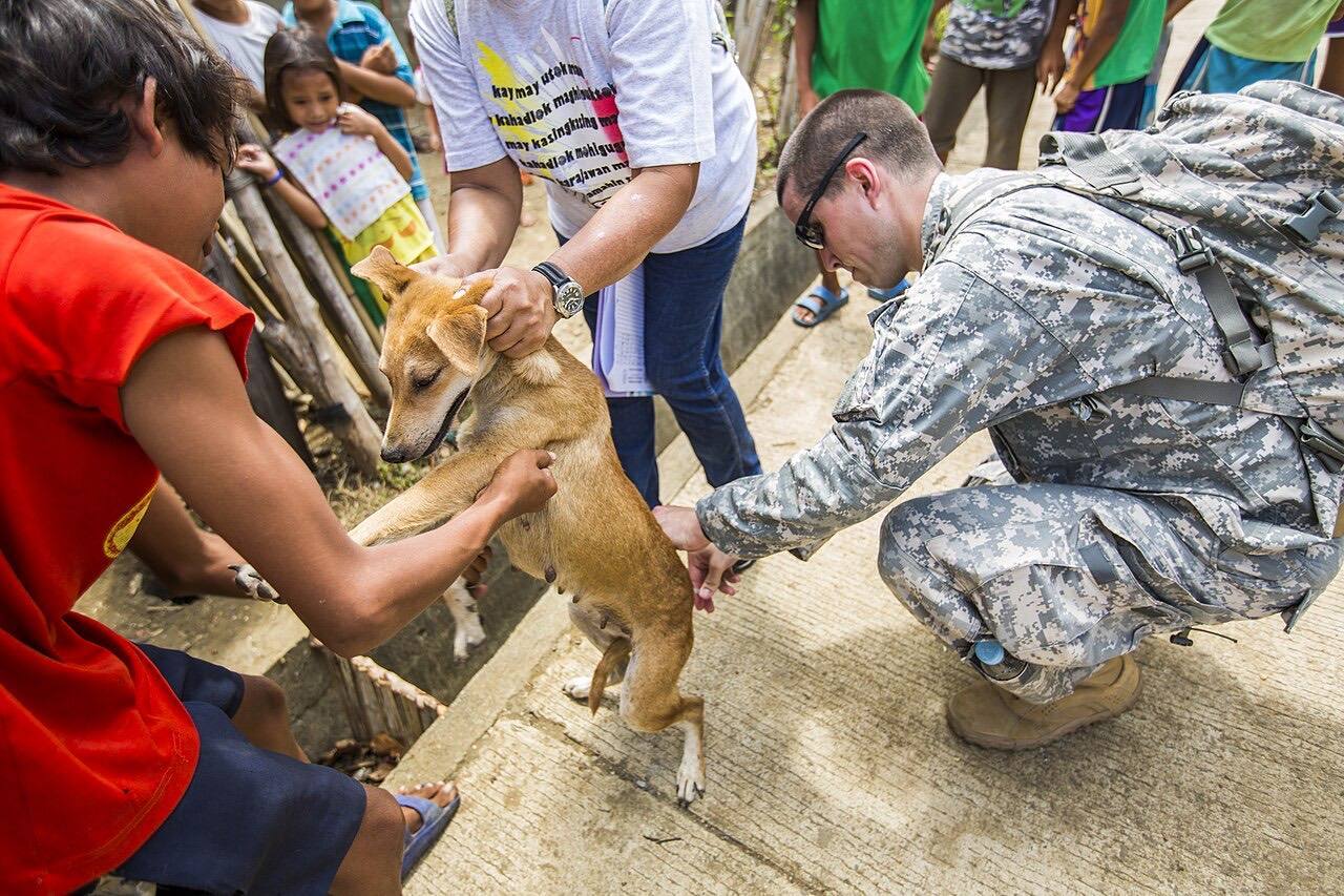 Vaccinations by the Hundreds 150418-M-AR450-196