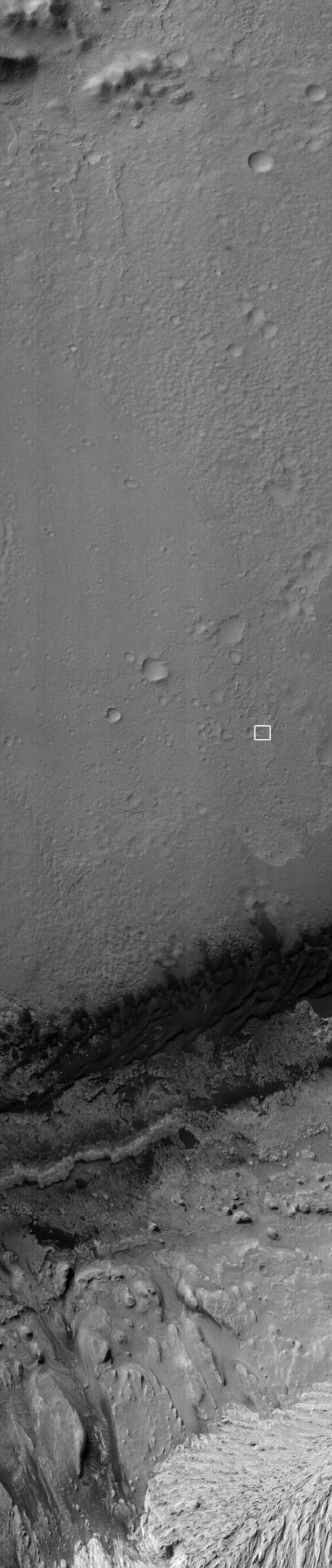 NASA Curiosity rover and its parachute were spotted by NASA Mars Reconnaissance Orbiter as Curiosity descended to the surface on Aug. 5 PDT Aug. 6 EDT.
