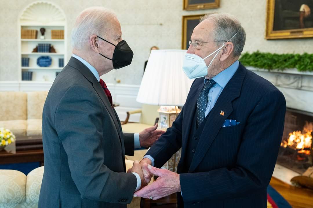President Joe Biden greets Senator Chuck Grassley before beginning discussions with him and Senator Dick Durbin about filling the vacancy in the Supreme Court b