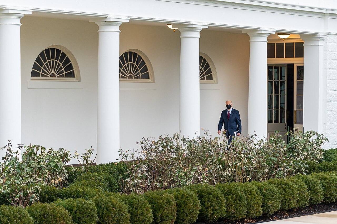 President Joe Biden walks along the Colonnade of the White House, Tuesday, January 25, 2022, to the Oval Office. (Official White House Photo by Adam Schultz)