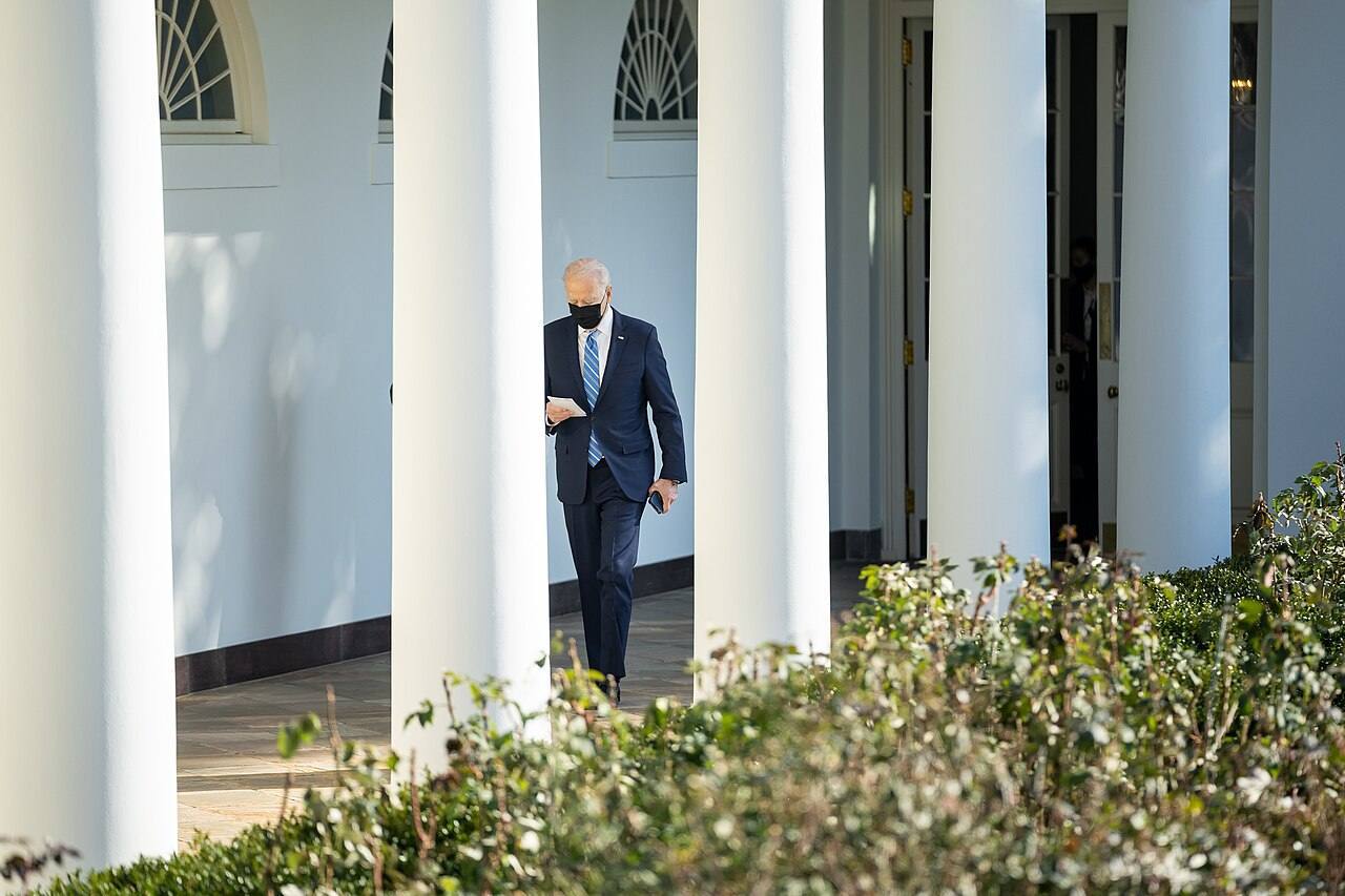 President Joe Biden walks along the West Colonnade of the White House, Wednesday, January 26, 2022, on his way to the Oval Office. (Official White House Photo b